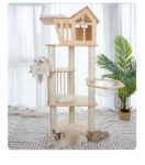 A playful tabby cat explores the Kawayan Cat Tree, a three-story cat condo featuring sisal scratching posts, plush platforms, a unique attic cottage perched on top, and a whimsical design that complements any home decor.